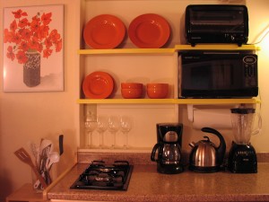 Appliances pose in the kitchenette. The salad spinner is too shy.